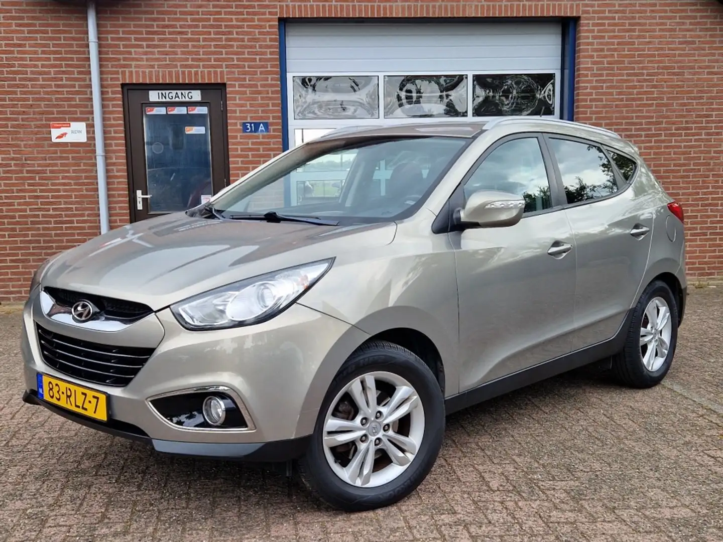 Hyundai iX35 2.0i Business Edition Navi NL-auto Clima Trekhaak Grijs - 1