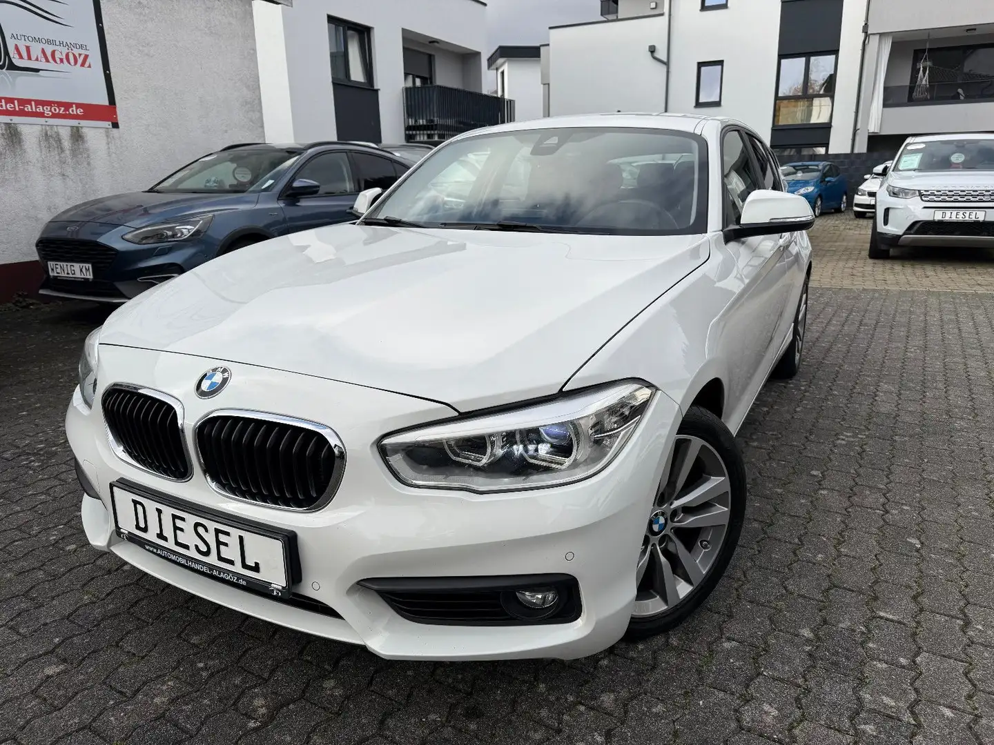 BMW 118 d Advantage STEPTRONIC NAVI LED 2xPDC SHZ Eu6 Weiß - 1