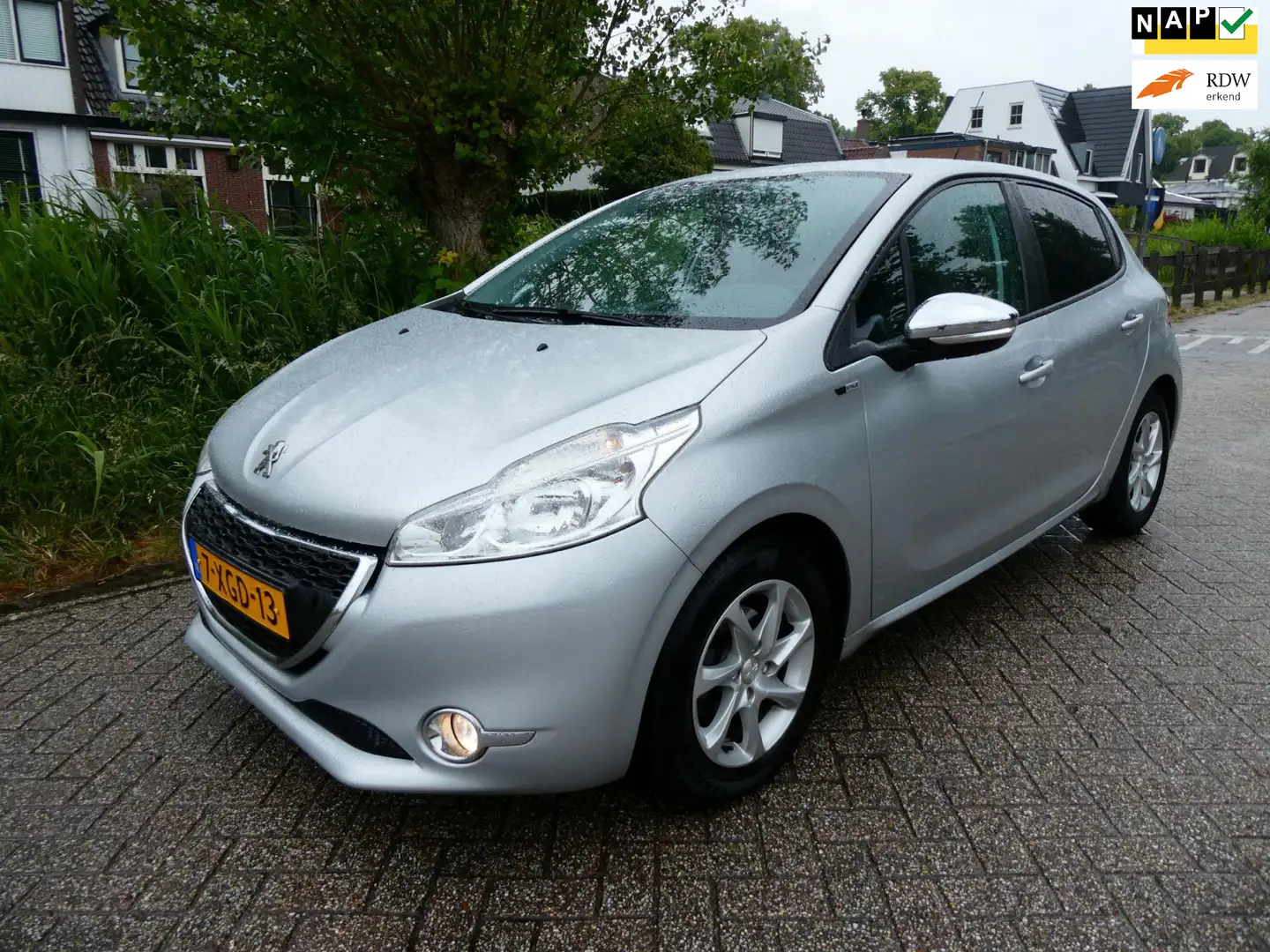 Peugeot 208 1.2 VTi Style 5-deurs Airco Cruise Navi Trekhaak 1 Grijs - 1