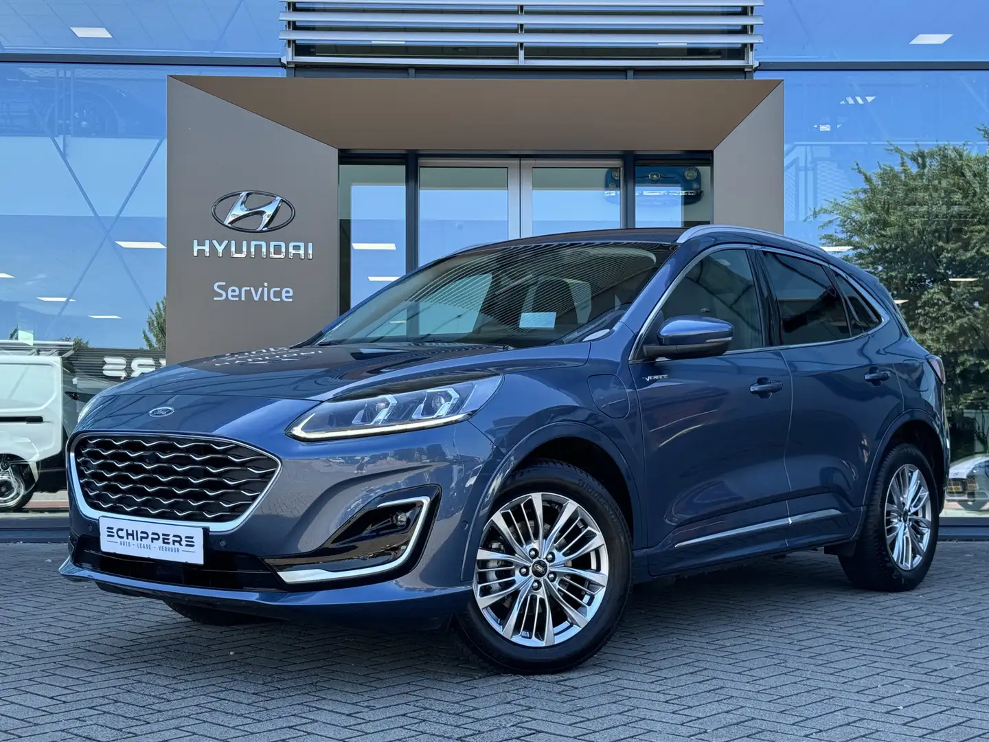 Ford Kuga 2.5 PHEV Vignale Blauw - 1