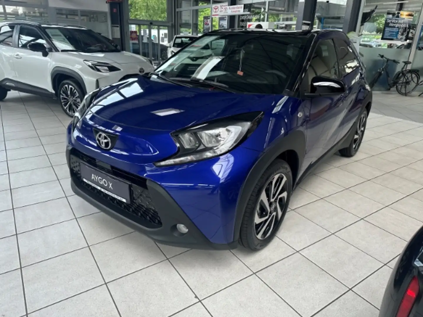 Toyota Aygo X Team D 1.0 VVT-i Automatik, Rückfahrkamera, Sitzhe Blau - 1