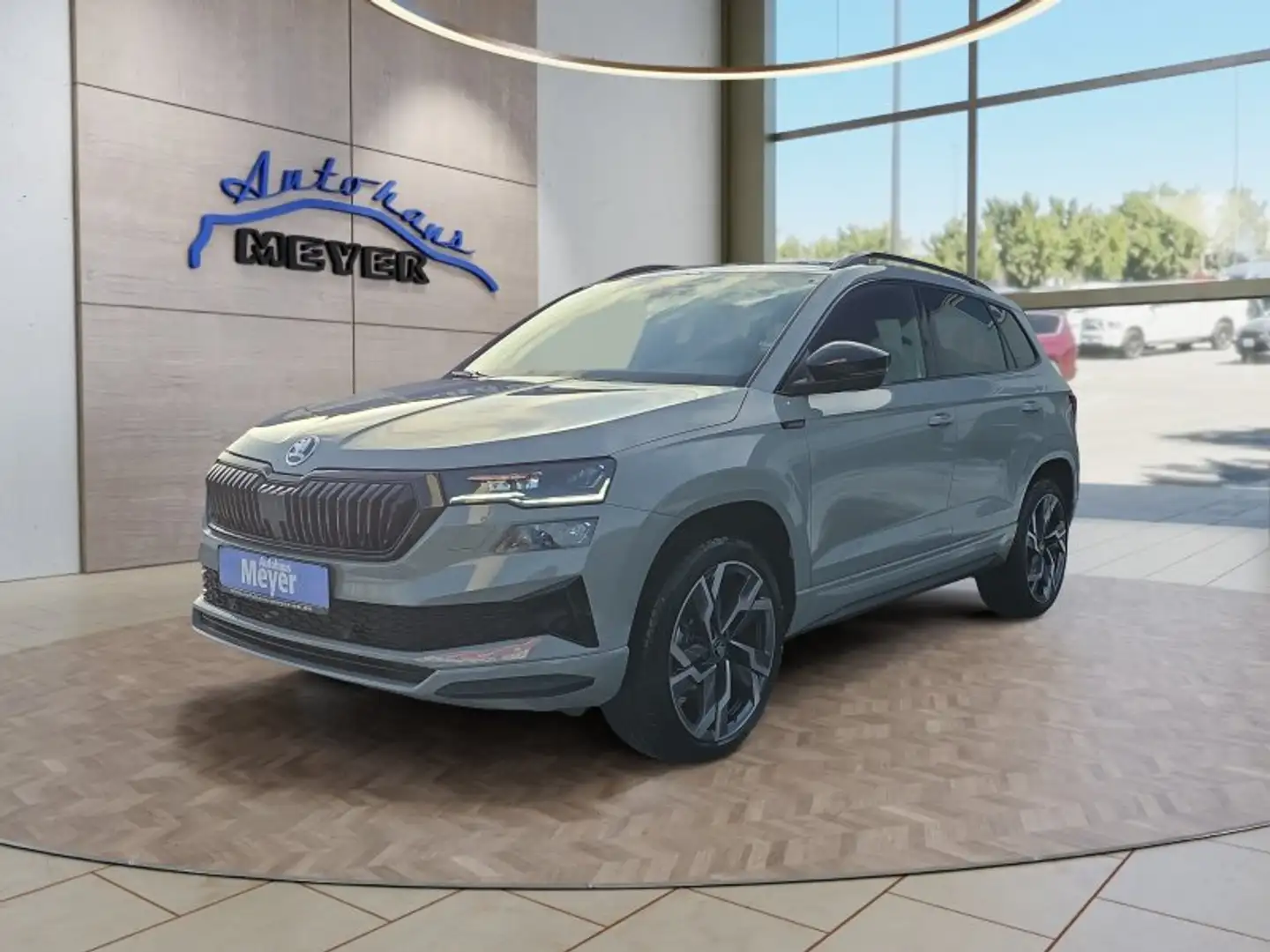 Skoda Karoq Sportline 2,0TSI DSG AHK/4*J.Gar/Navi/Matrix     * Grijs - 2