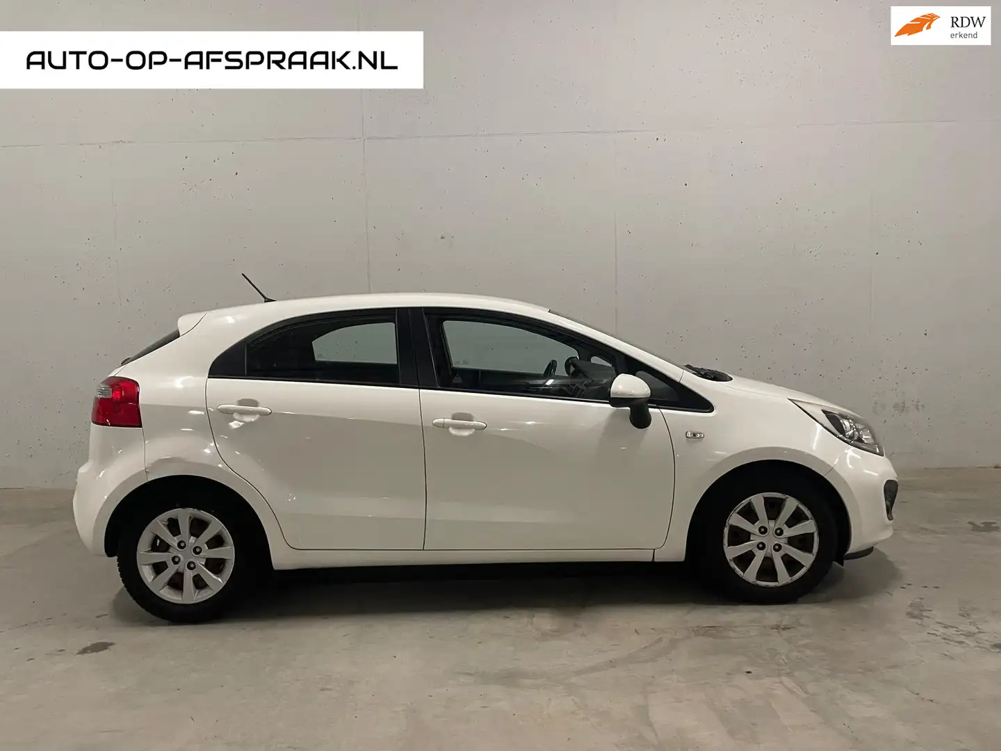 Kia Rio 1.1 CRDi 5drs. Navi Camera Airco Cruise APK Wit - 1
