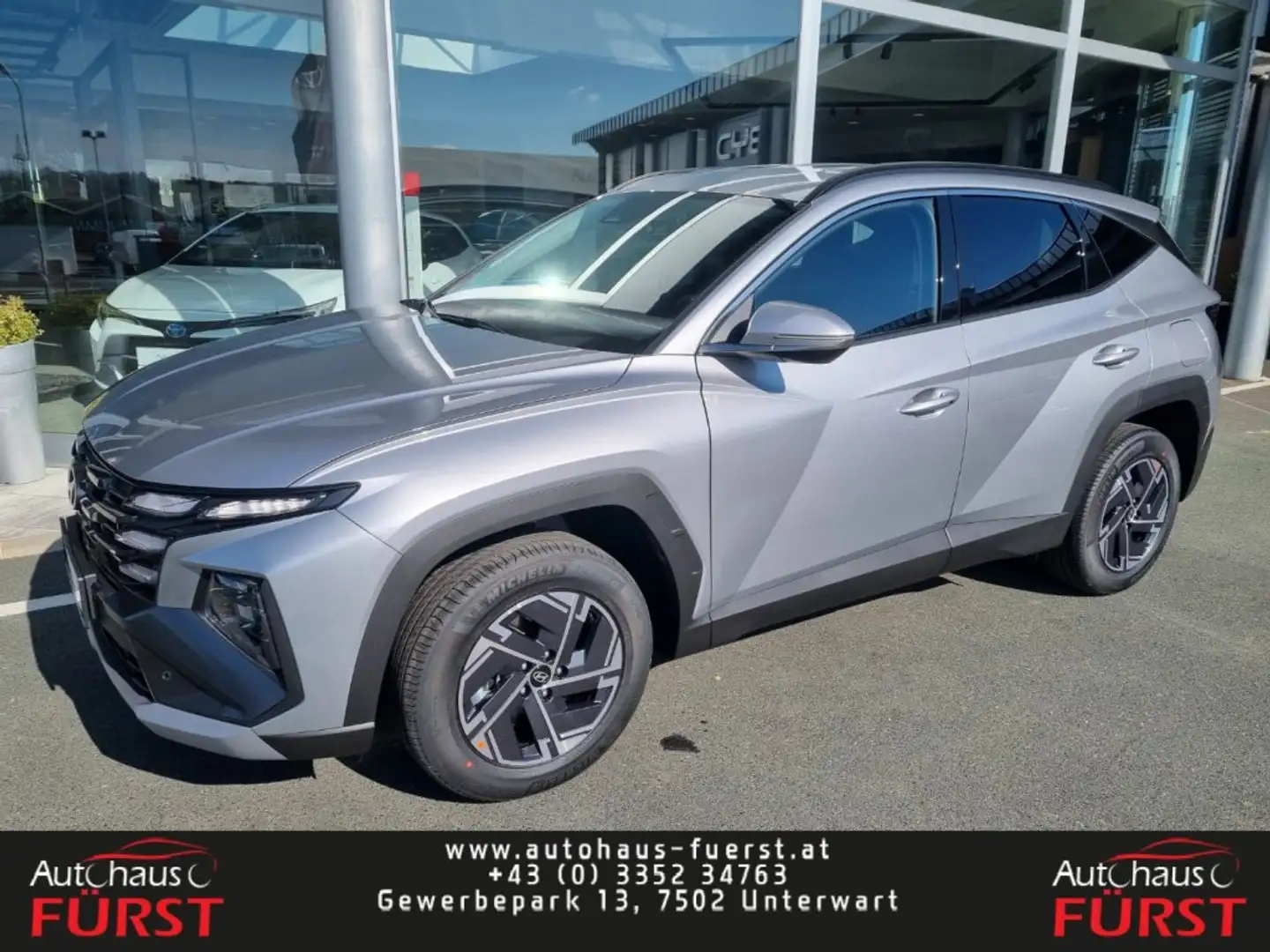 Hyundai TUCSON NX4 Jubile 1,6 T-GDi HEV 2WD AT t6hj1 Silber - 1