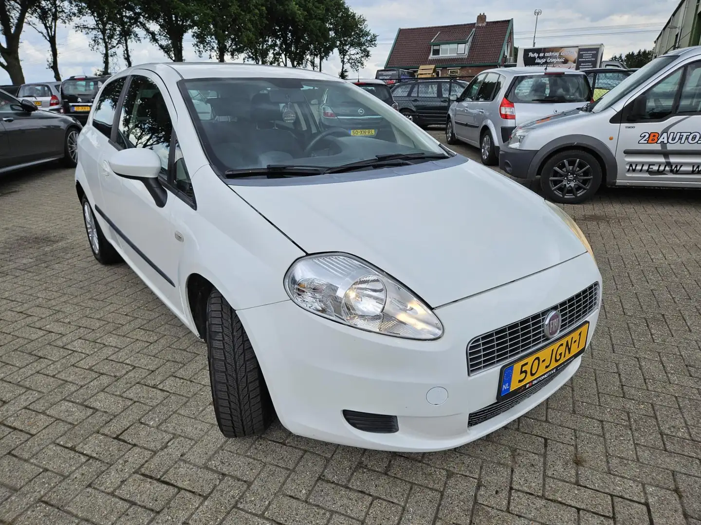 Fiat Grande Punto 1.4 Edizione Lusso 2009. Airco/Lichtmetaal/Trekhaa Wit - 2