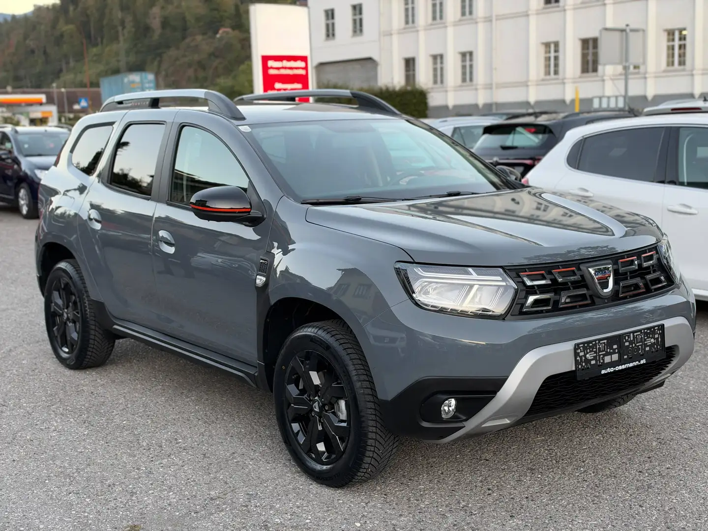 Dacia Duster Diesel Allrad Extreme | Navi | Leder | Anhängerk. | 360° Kamera | SHZ | Grau - 1