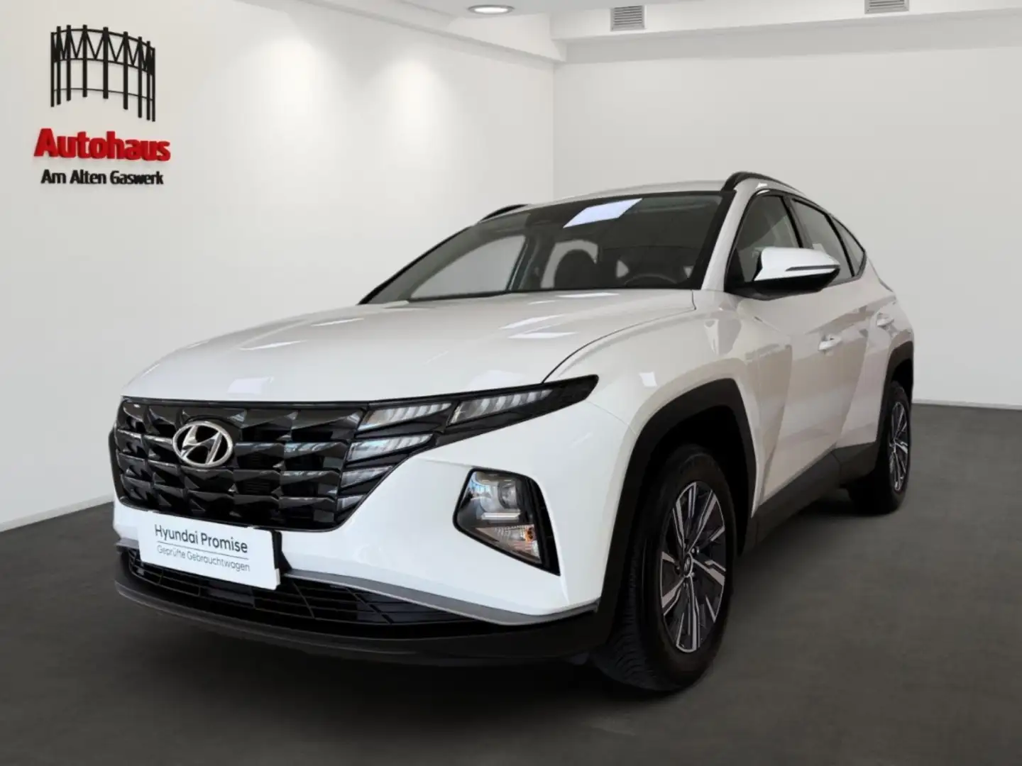 Hyundai TUCSON HYBRID AUTOMATIK+NAVI+SITZHZG+KAMERA+APPLE/ANDROID Weiß - 1