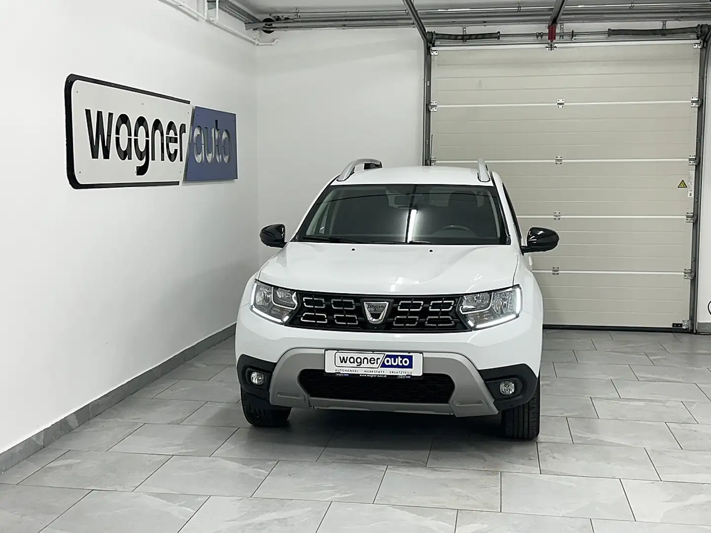 Dacia Duster dCi 115 4WD Celebration LED/Navi/AHK/RFK Weiß - 1