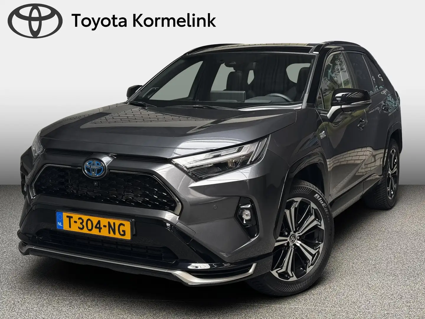 Toyota RAV 4 2.5 Plug-in Hybrid AWD Bi-Tone Plus automaat Grijs - 1
