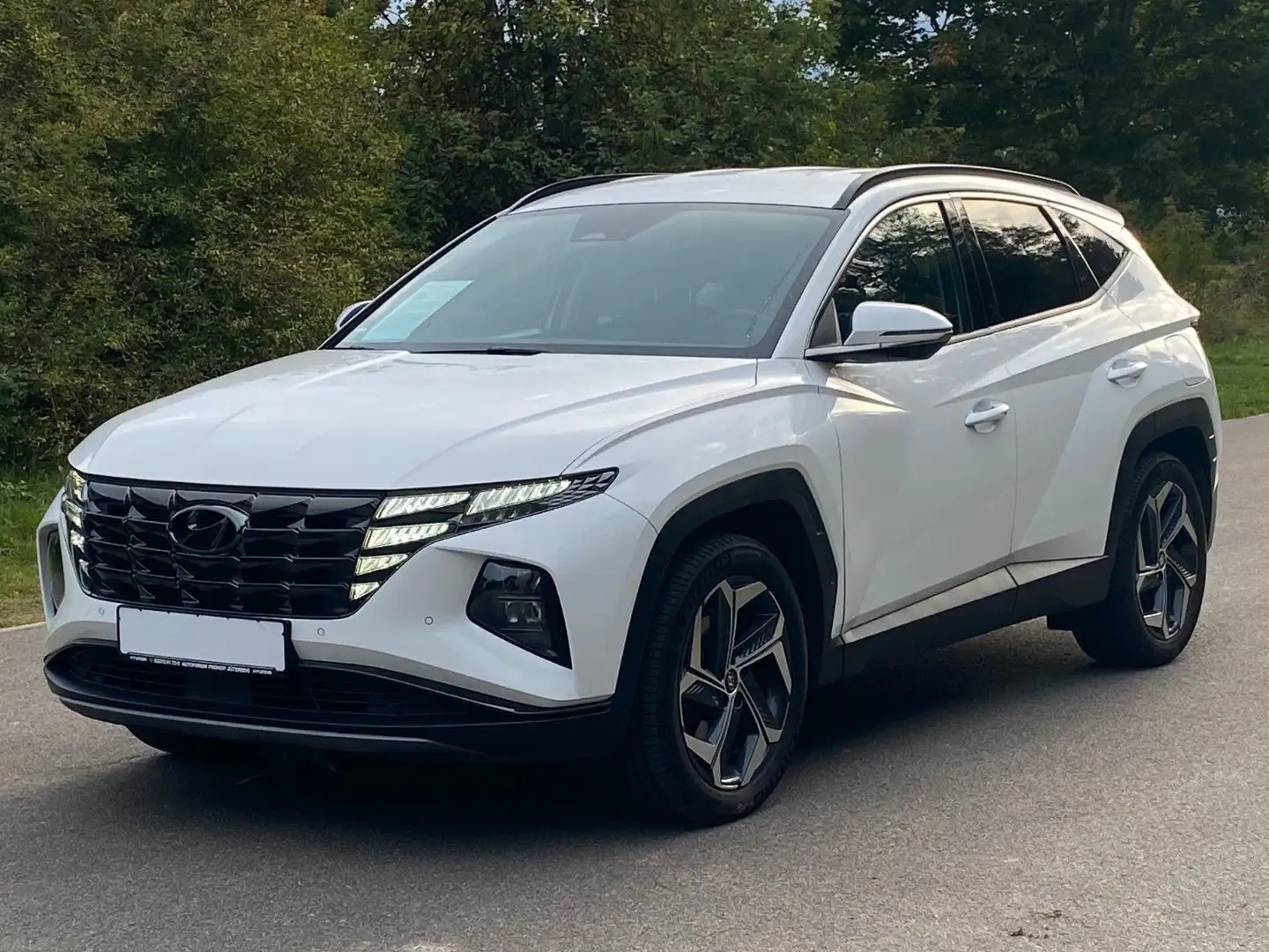 Hyundai TUCSON 1.6 T-GDI PHEV *Navi*ACC*LED*RFKamera* Weiß - 1