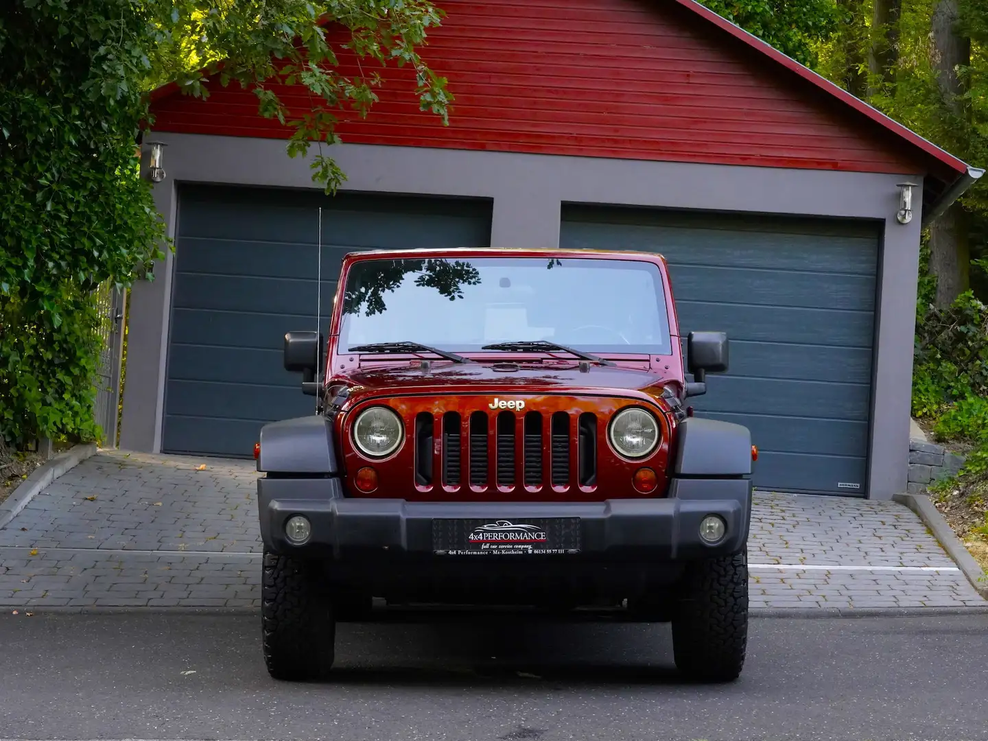 Jeep Wrangler 2.8 CRD Unlimited Sahara Auto.*Navi~AHK* Rood - 2