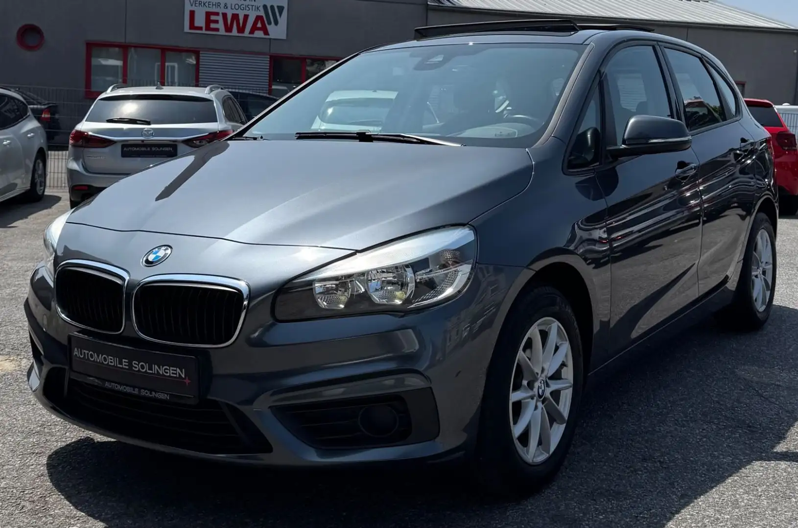 BMW 218 i Active Tourer AUT+PANO+NAVI+PDC+SHZ+LM+GRA+ Grigio - 1