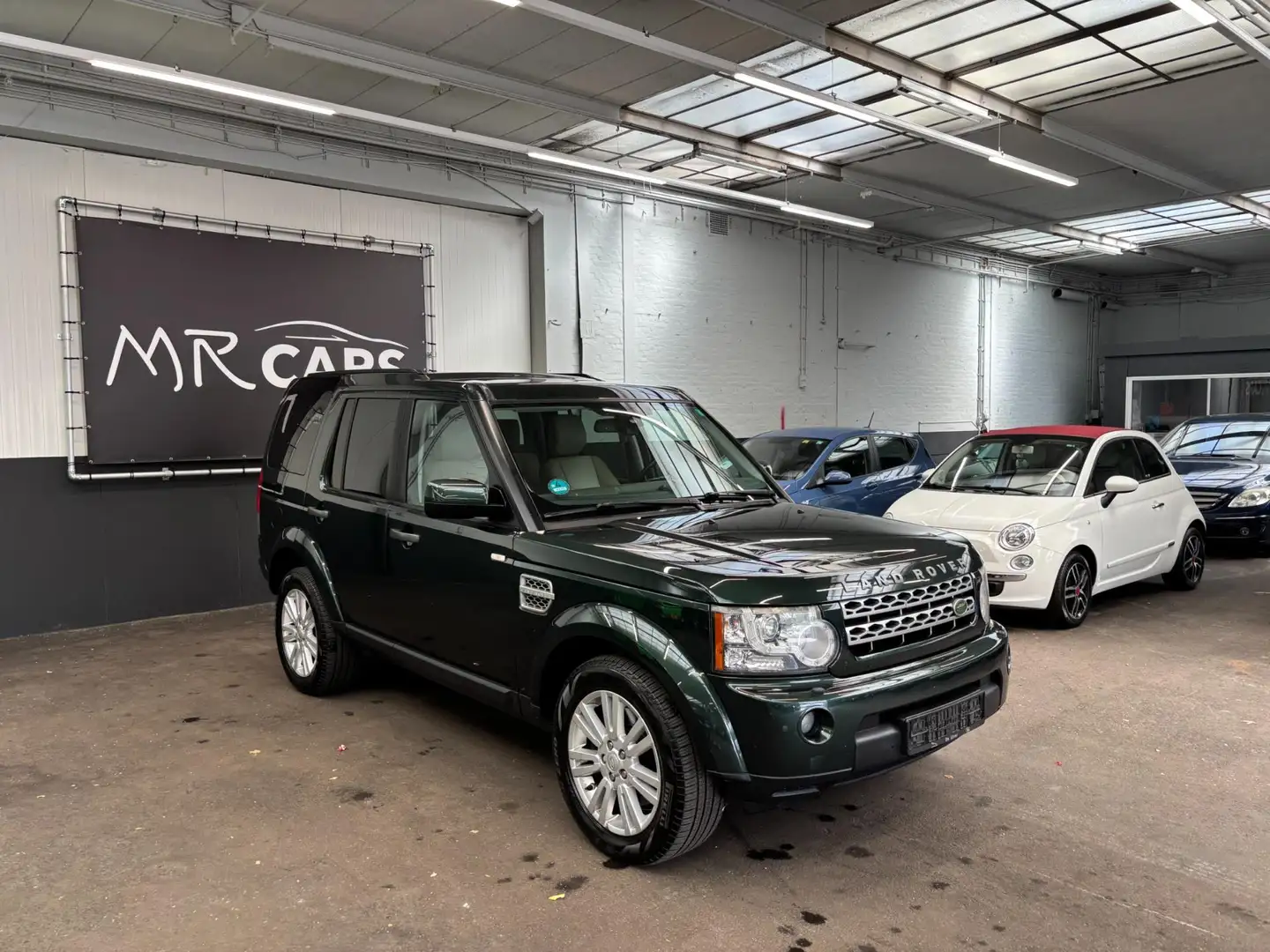 Land Rover Discovery 3.0 SDV6 HSE 7.p Groen - 2
