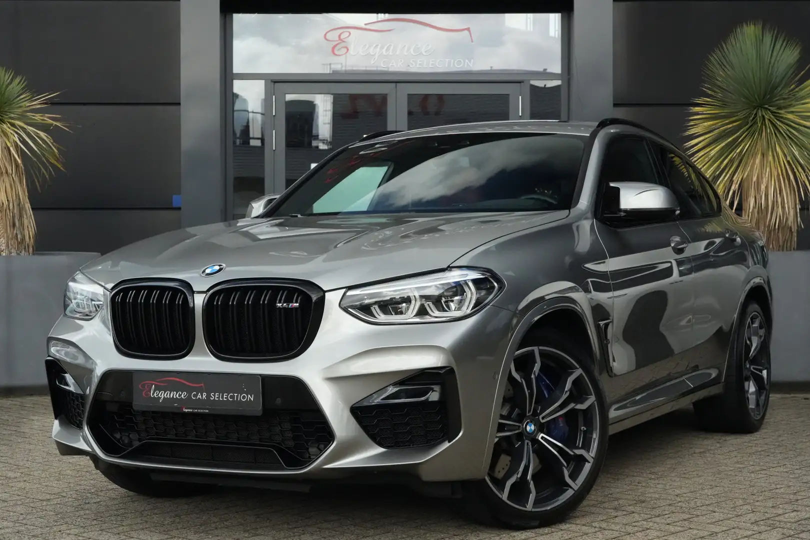BMW X4 M 510pk Panoramadak/Stoelverwarming/Camera Grijs - 1