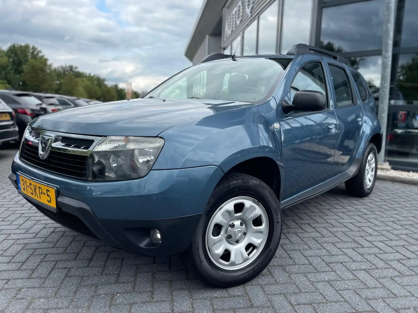 Dacia Duster 1.6 Lauréate | Airco | 4X4 | 1e Eigenaar | Origine Bleu - 2