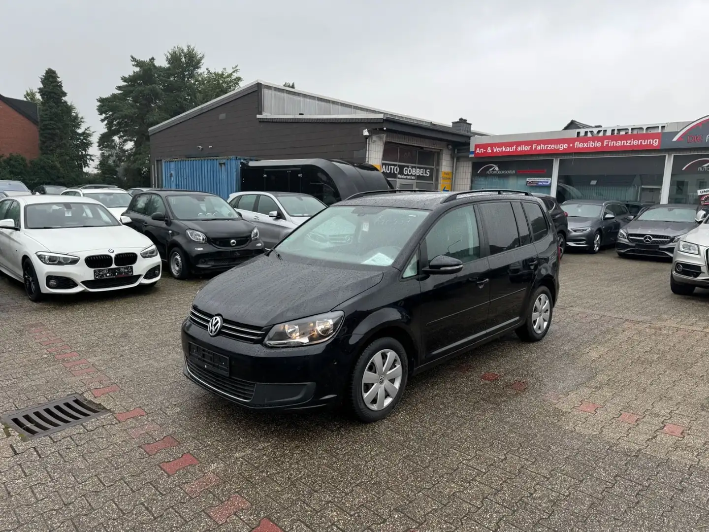 Volkswagen Touran PANO Parklenk. PDC vo+ht Klimaauto NAVIGA Zwart - 1