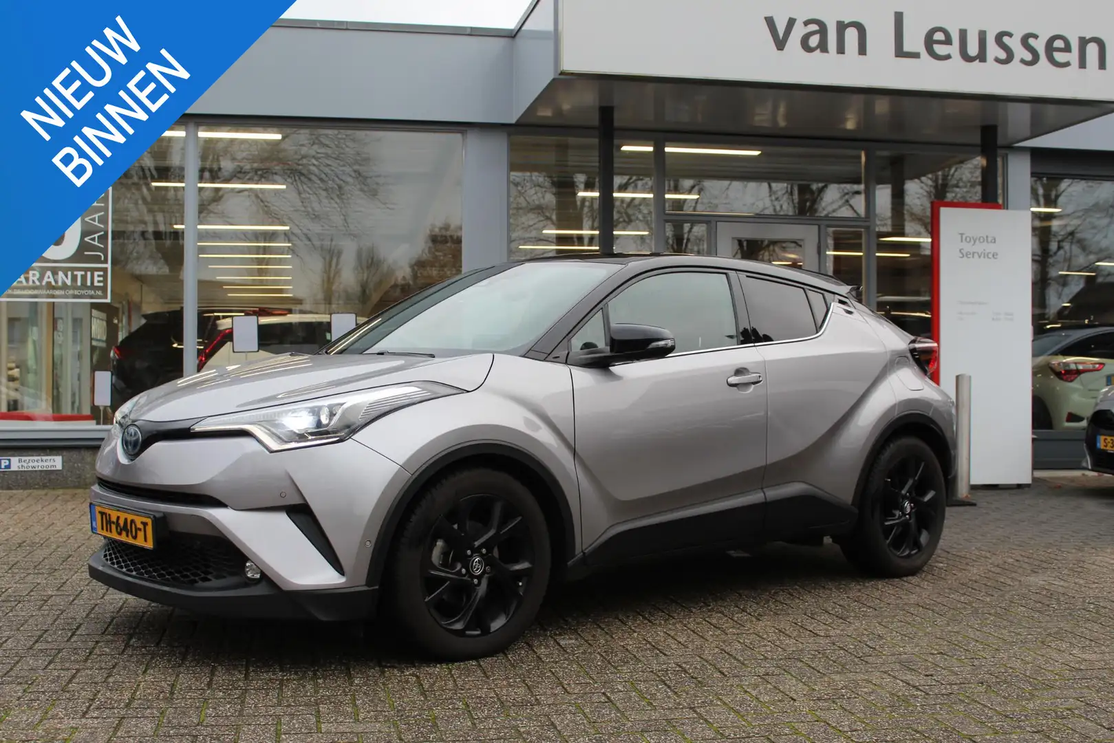 Toyota C-HR 1.8 Hybrid Bi-Tone AFN.TREKHAAK LEER NAVI ALL SEAS Grijs - 1