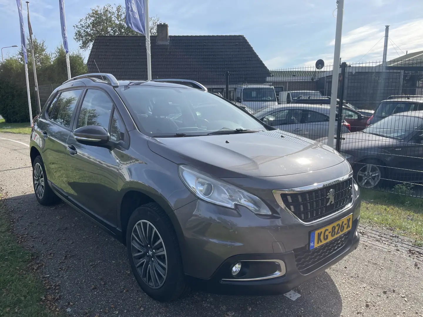 Peugeot 2008 1.2 PureTech Blue Lion | Panoramadak | Dealer Onde Gris - 1