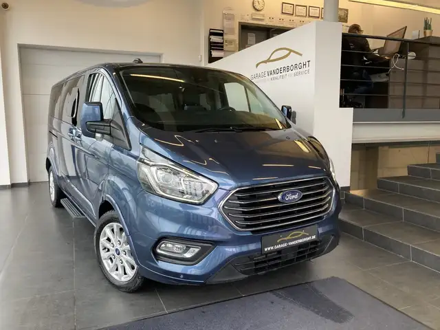 Ford Tourneo Custom TITANIUM X 8 ZIT HYBRID  WAARBORG TOT 24/4/2028 .