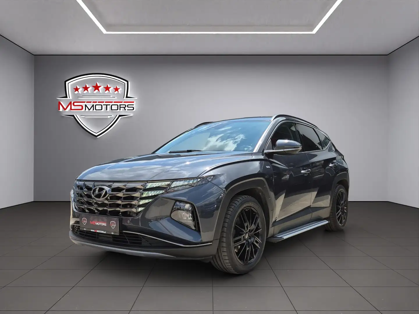 Hyundai TUCSON 1,6 CRDI 4WD 48V Trend Line*RFK*KEYLESS*19 ZOLL Grau - 1