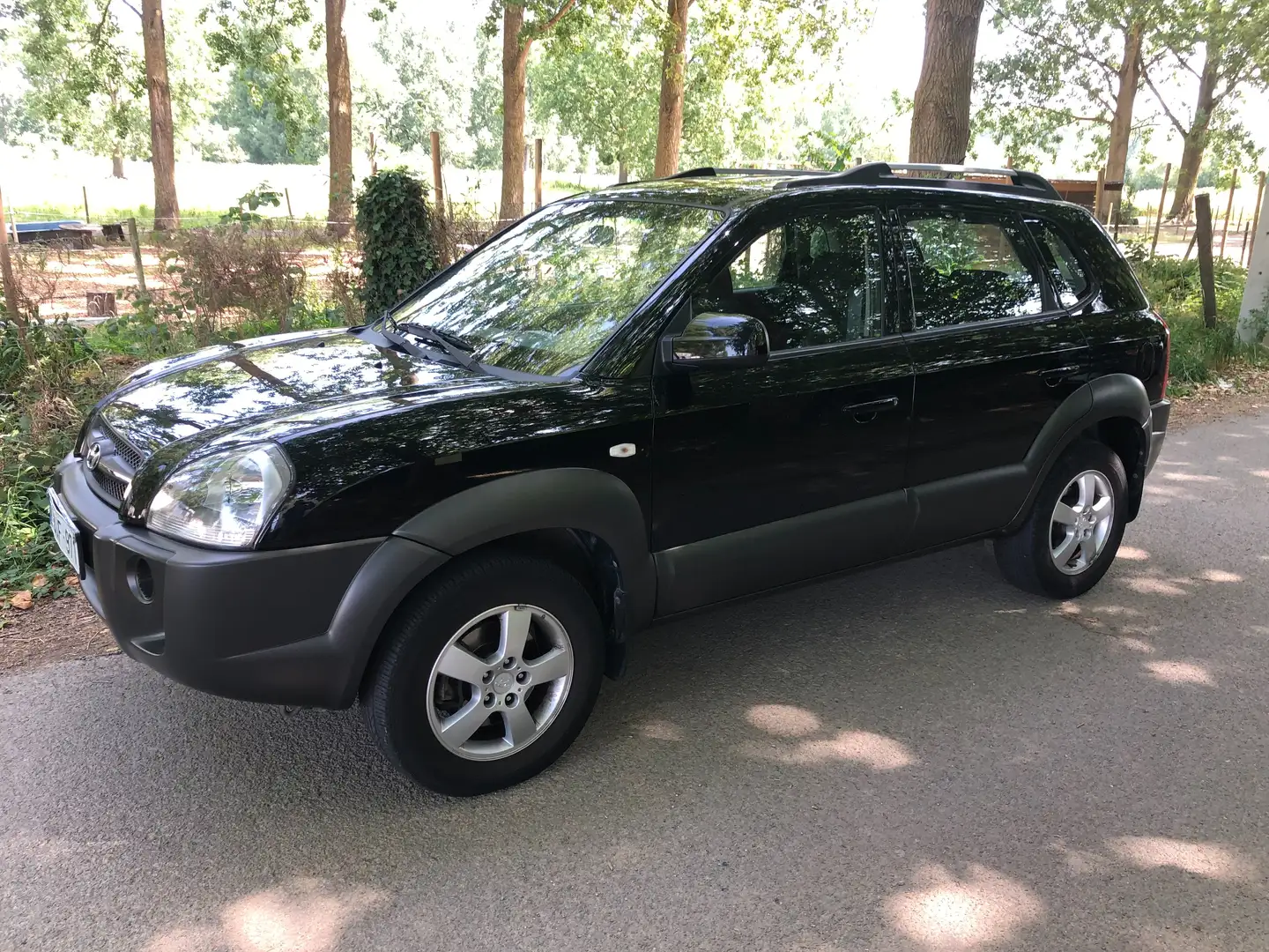 Hyundai TUCSON 2.0i 16v Comfort  57397 km !!!! Zwart - 1