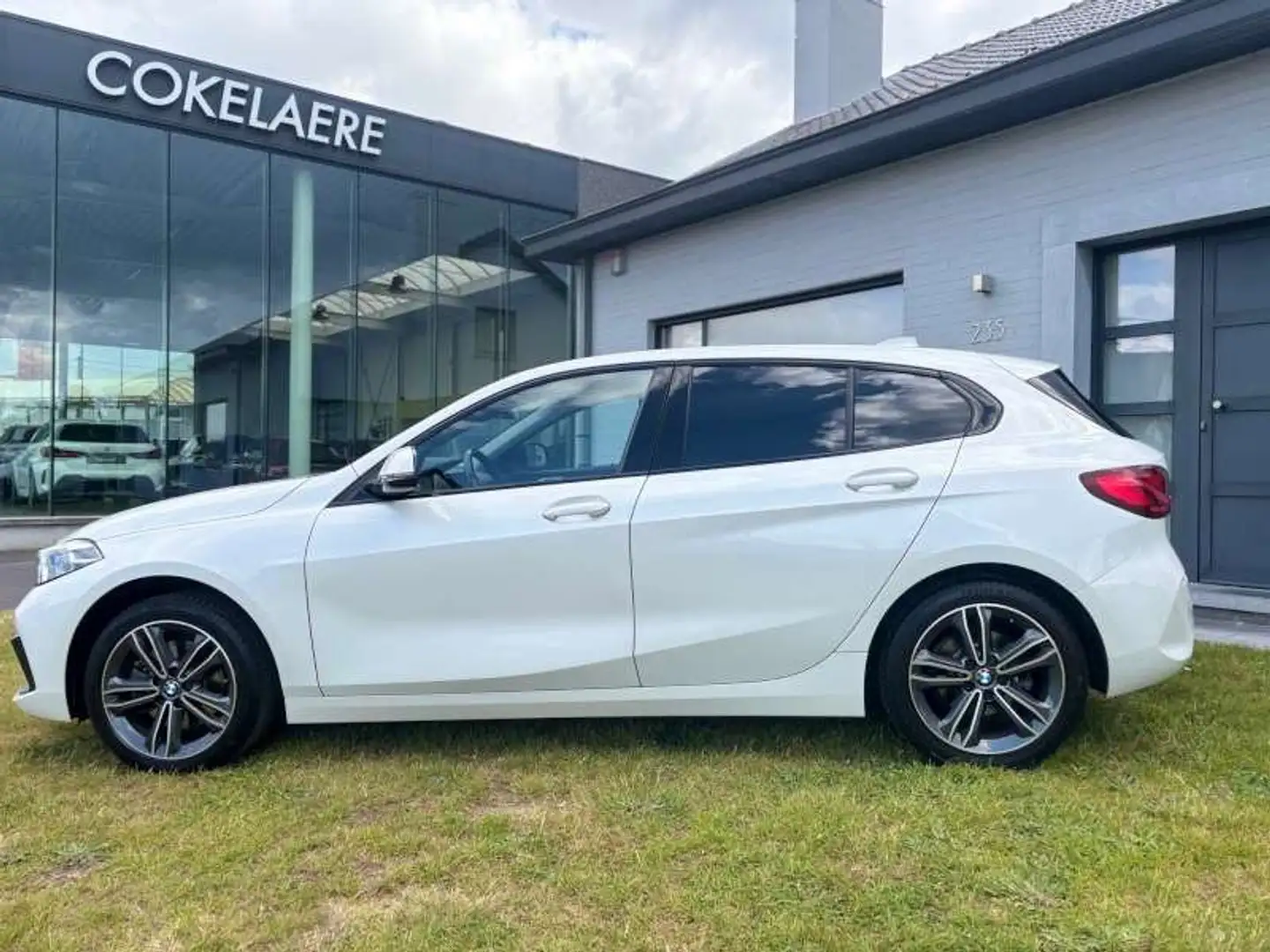BMW 116 i SportLine Navi/LED/AutAirco/Cruise/CarPlay/DAB Wit - 2