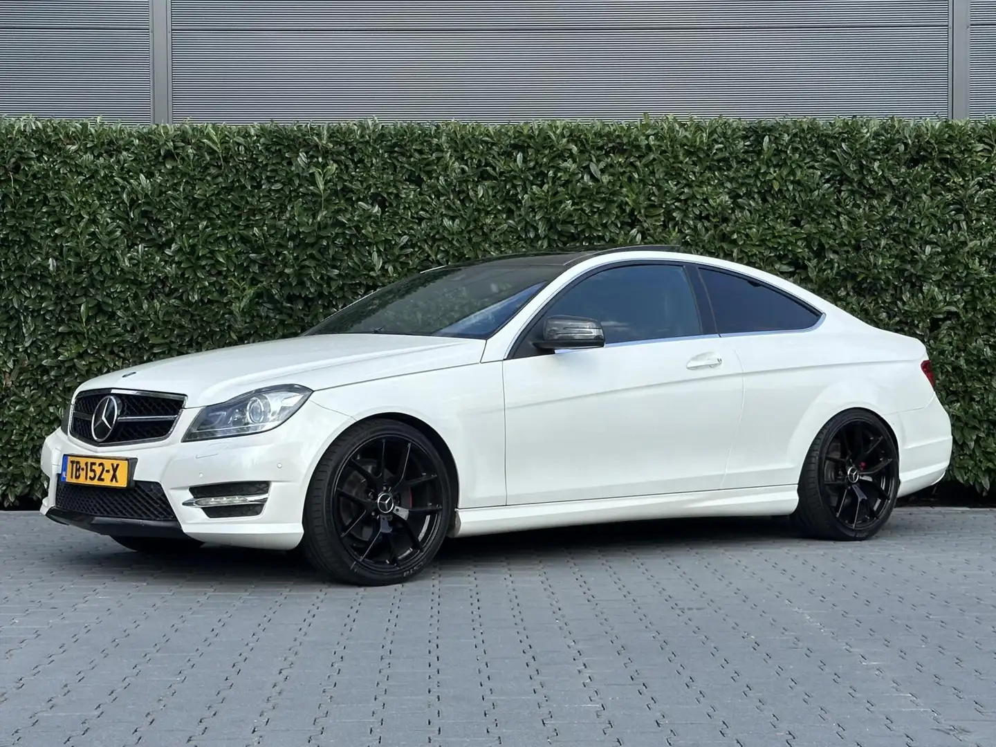 Mercedes-Benz C 200 Coupé Prestige FACELIFT, AMG-PAKKET, PANO, H/K, LE Wit - 1