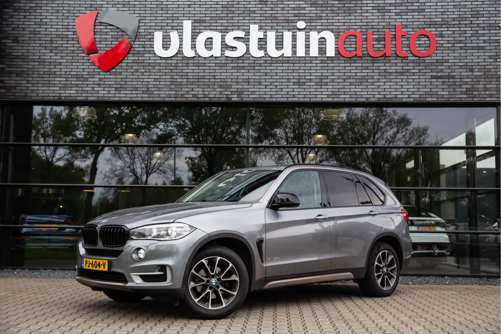 BMW X5 xDrive30d High Executive , Pano dak, Trekhaak, Grijs - 1