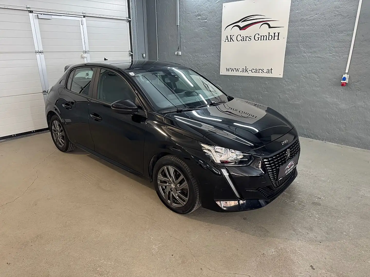 Peugeot 208 Automatik*Navi* Keyless*Drive Mode*Schaltwimppen* Schwarz - 1