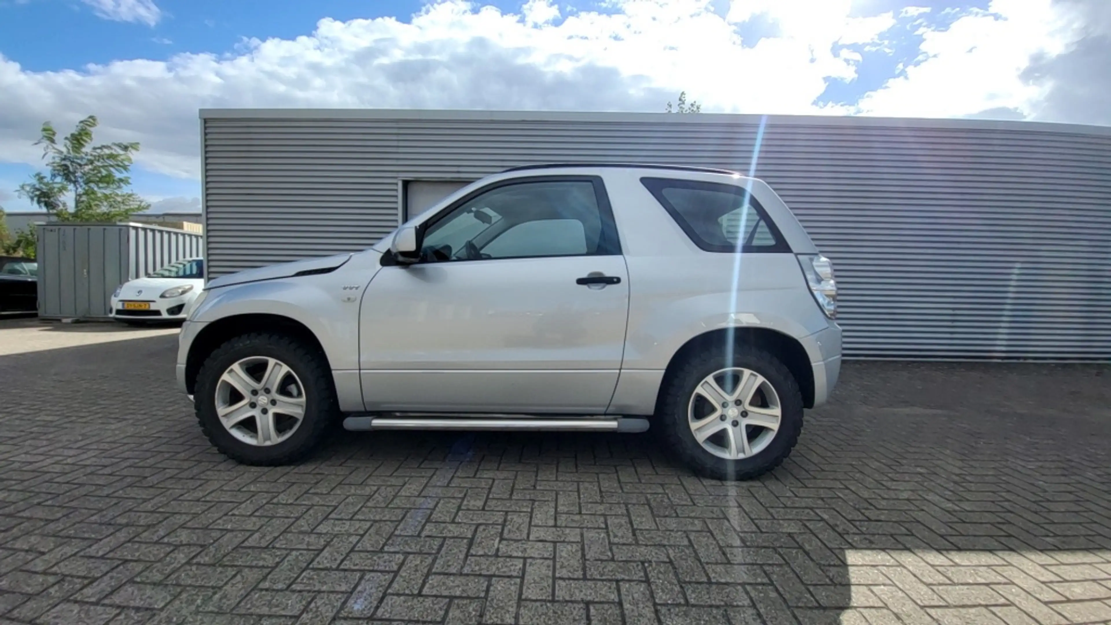 Suzuki Grand Vitara 1.6-16V Exclusive — photo 4