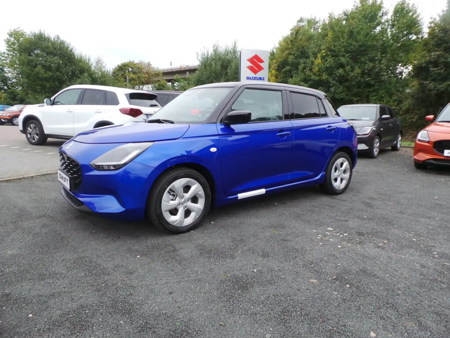 Suzuki Swift 1.2 Dualjet Hybrid 61 kW Comfort+ Bleu - 1