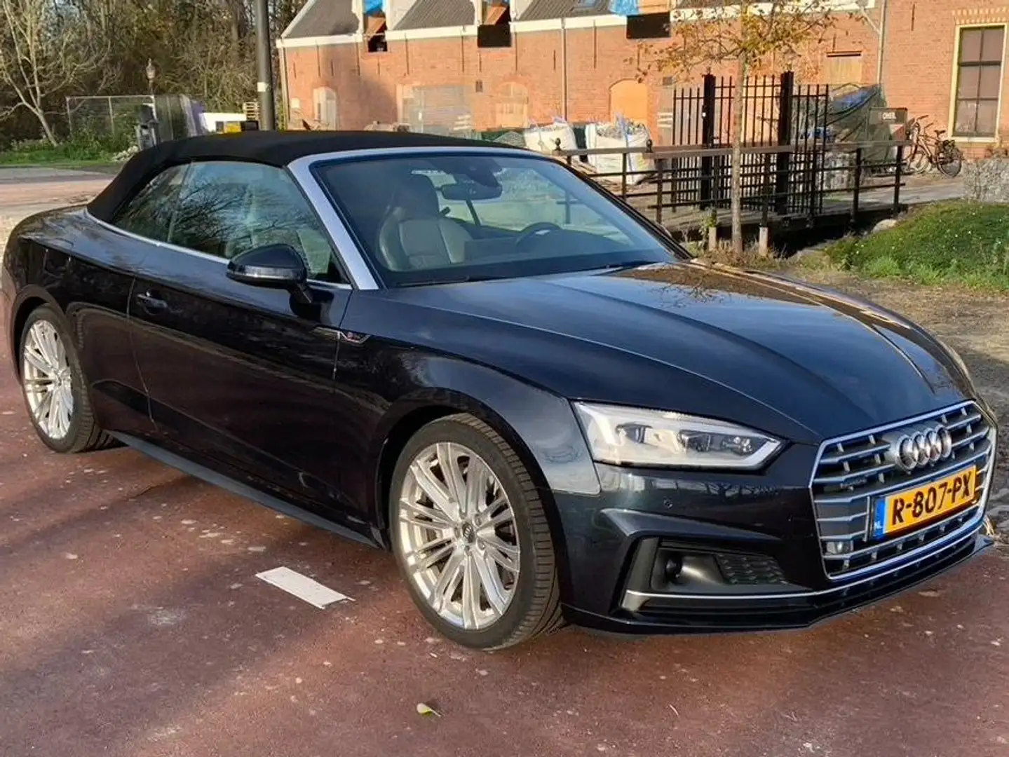 Audi A5 Cabriolet 2.0 TFSI Quatro 252pk S-Line Blauw - 1