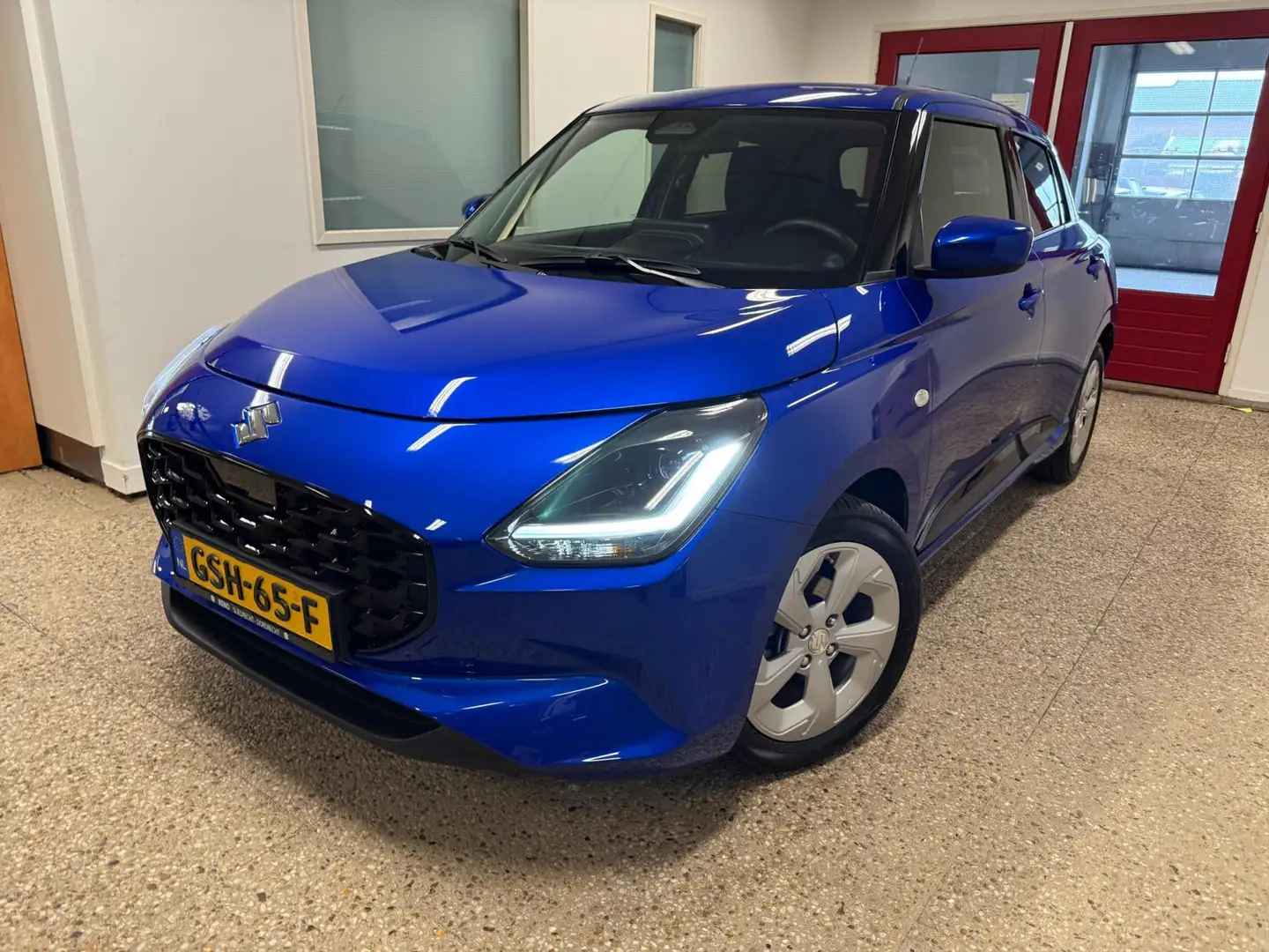 Suzuki Swift 1.2 Select Smart Hybrid | Navi | Carplay | 10 jaar Bleu - 1