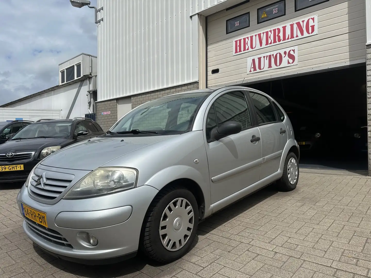 Citroen C3 1.4i Attraction | Airco | Cruise | APK Grijs - 1