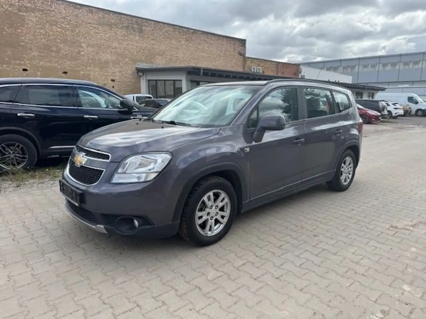 Chevrolet Orlando 1.8 LT *2.Hand*Klima*7Sitze*TÜV12/2026 Gris - 1