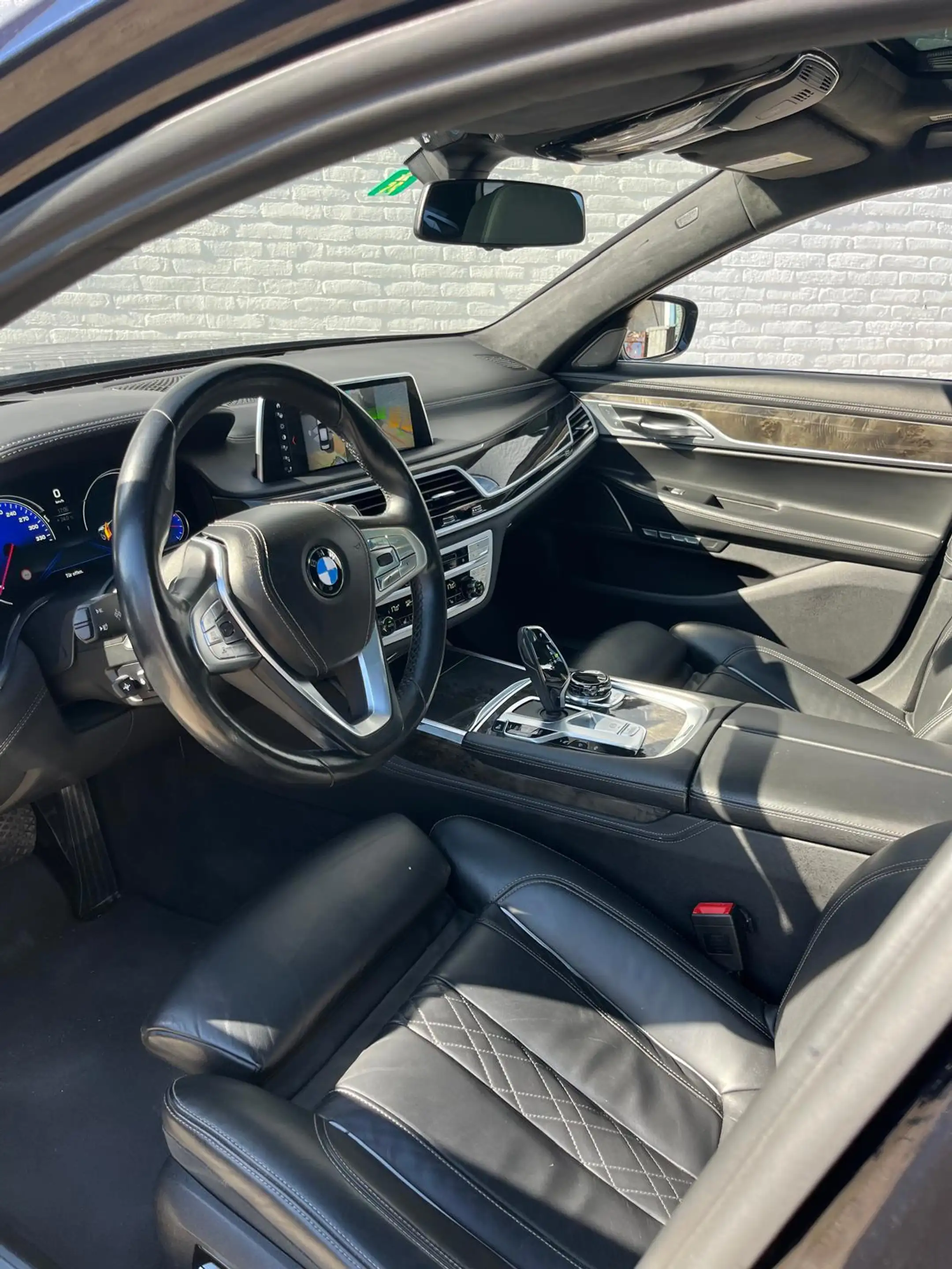 BMW 750 7-serie 750i xDrive High Executive — photo 11