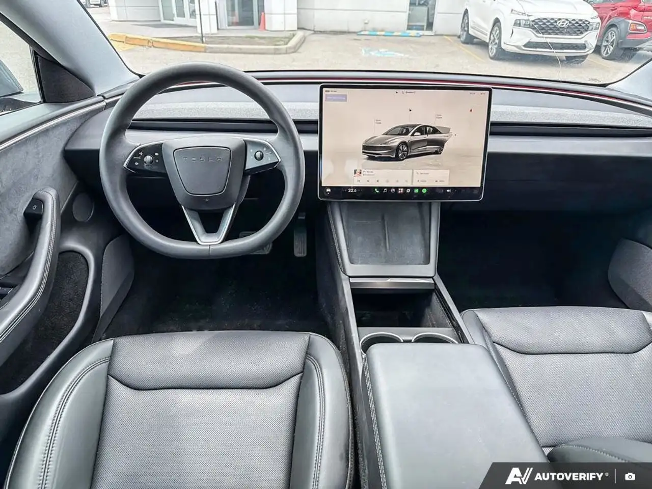 Tesla Model 3 photo Tesla Model 3