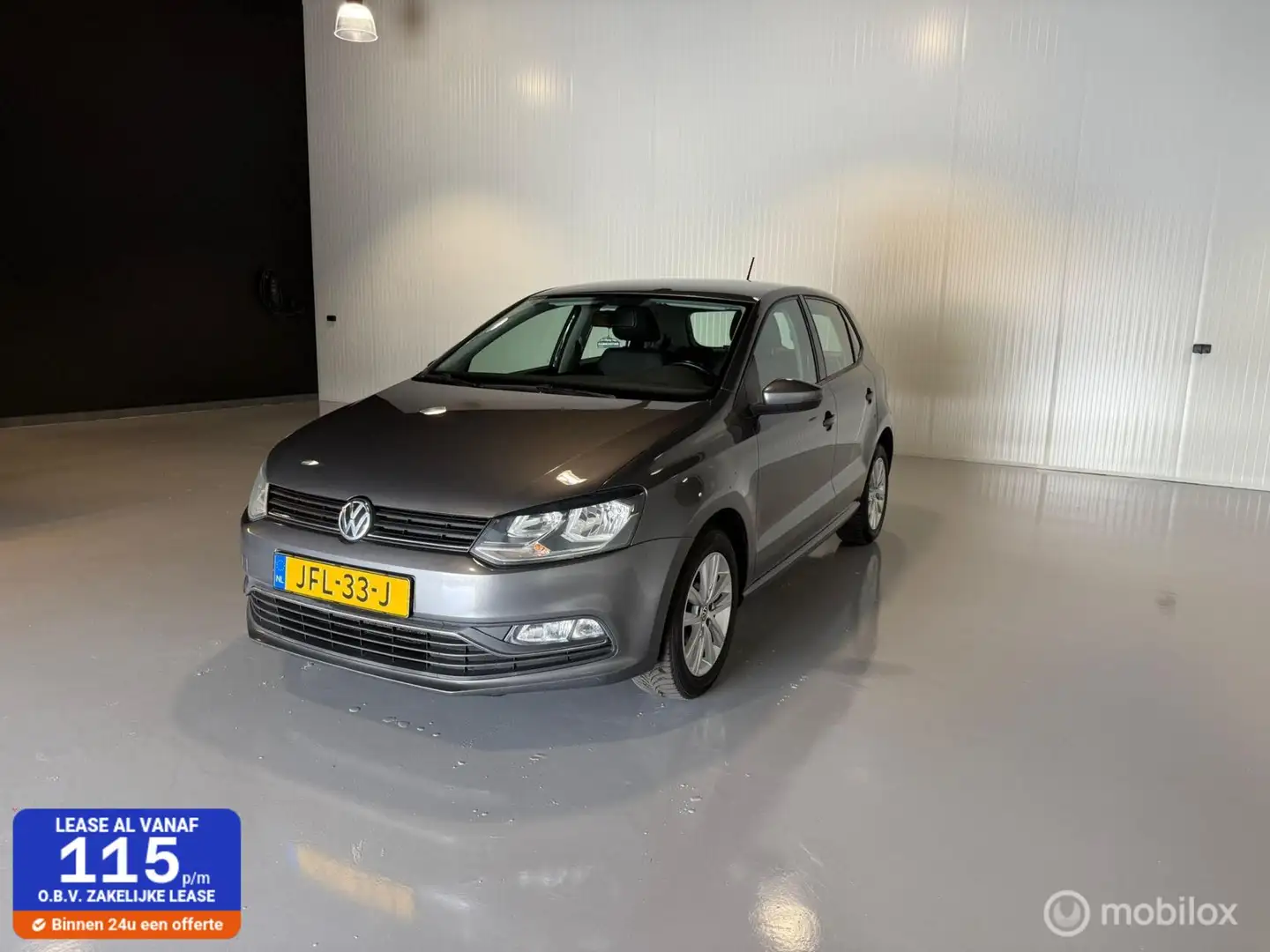 Volkswagen Polo 1.2 TSI Highline Grijs - 1