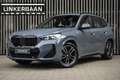 BMW X1 18i sDrive | M Sportpakket | Full Option | Panodak Gris - thumbnail 1