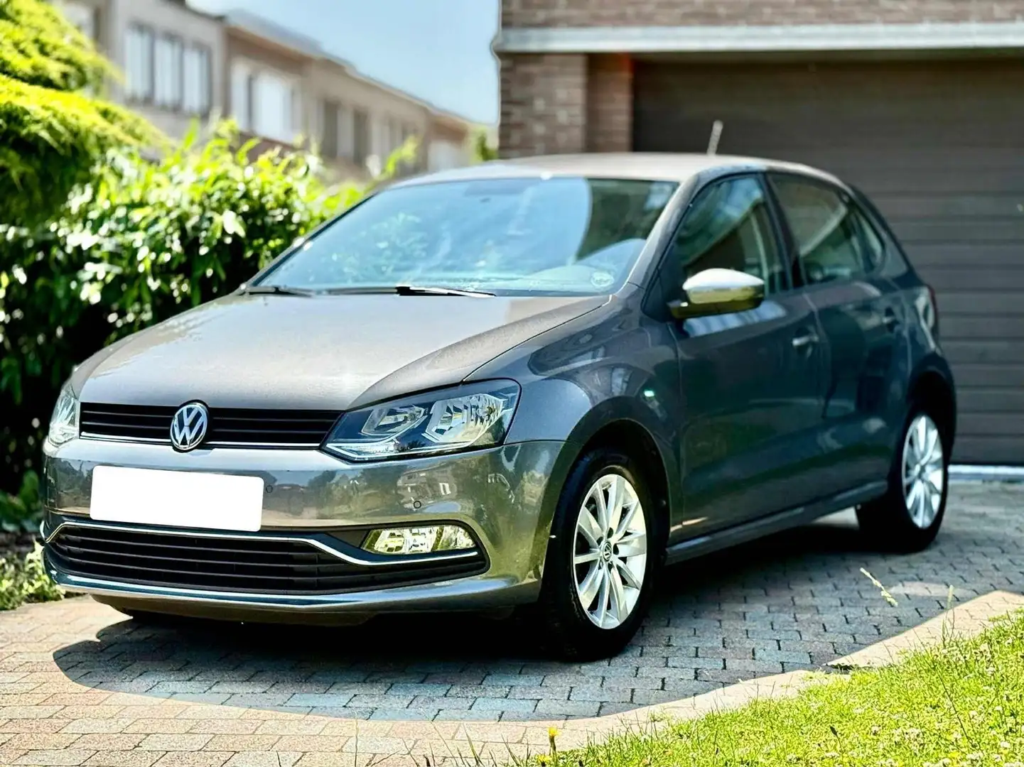 Volkswagen Polo 1.0i • ALU VELGEN • PARKEERSENSOR • 4SEASON Grijs - 1