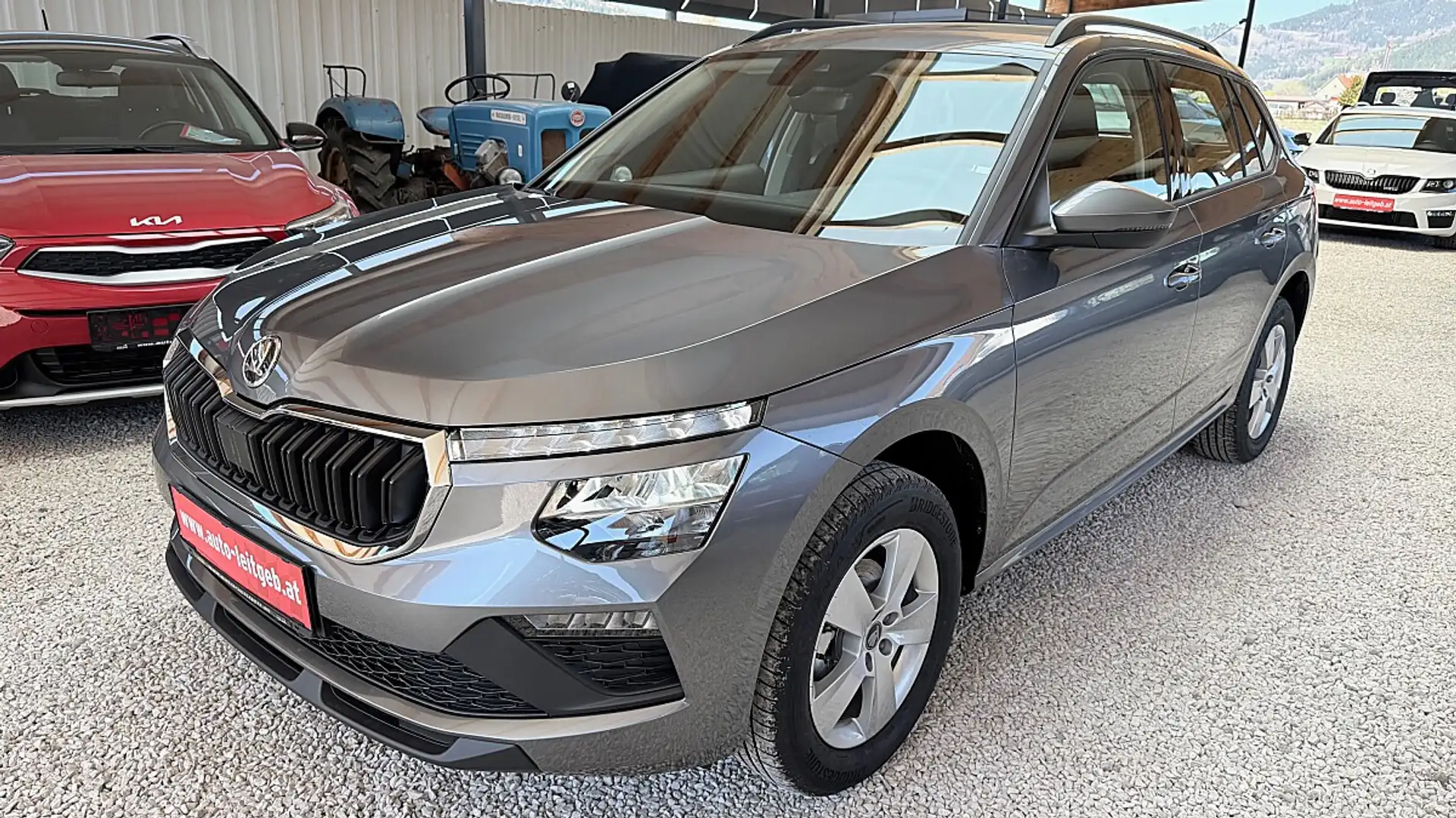 Skoda Kamiq 1,0 TSI Essence DSG Grau - 1