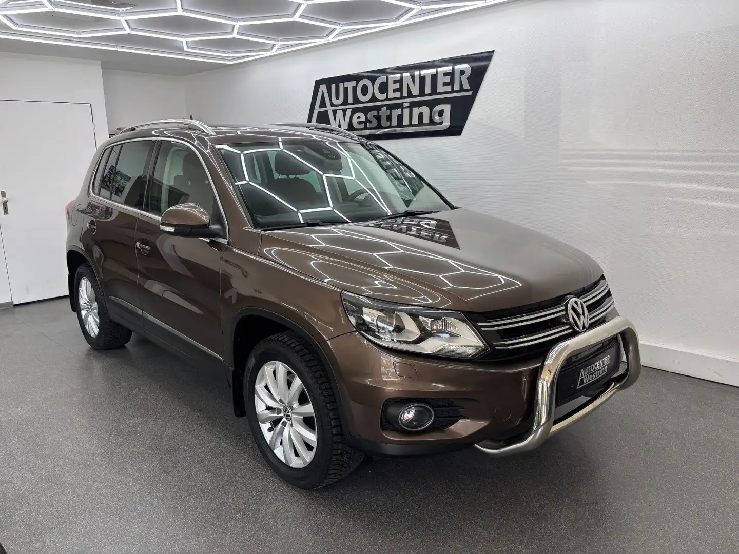 Volkswagen Tiguan 2.0 TDI 4Motion*1.Hand*Xenon*Navi*AHK Braun - 1