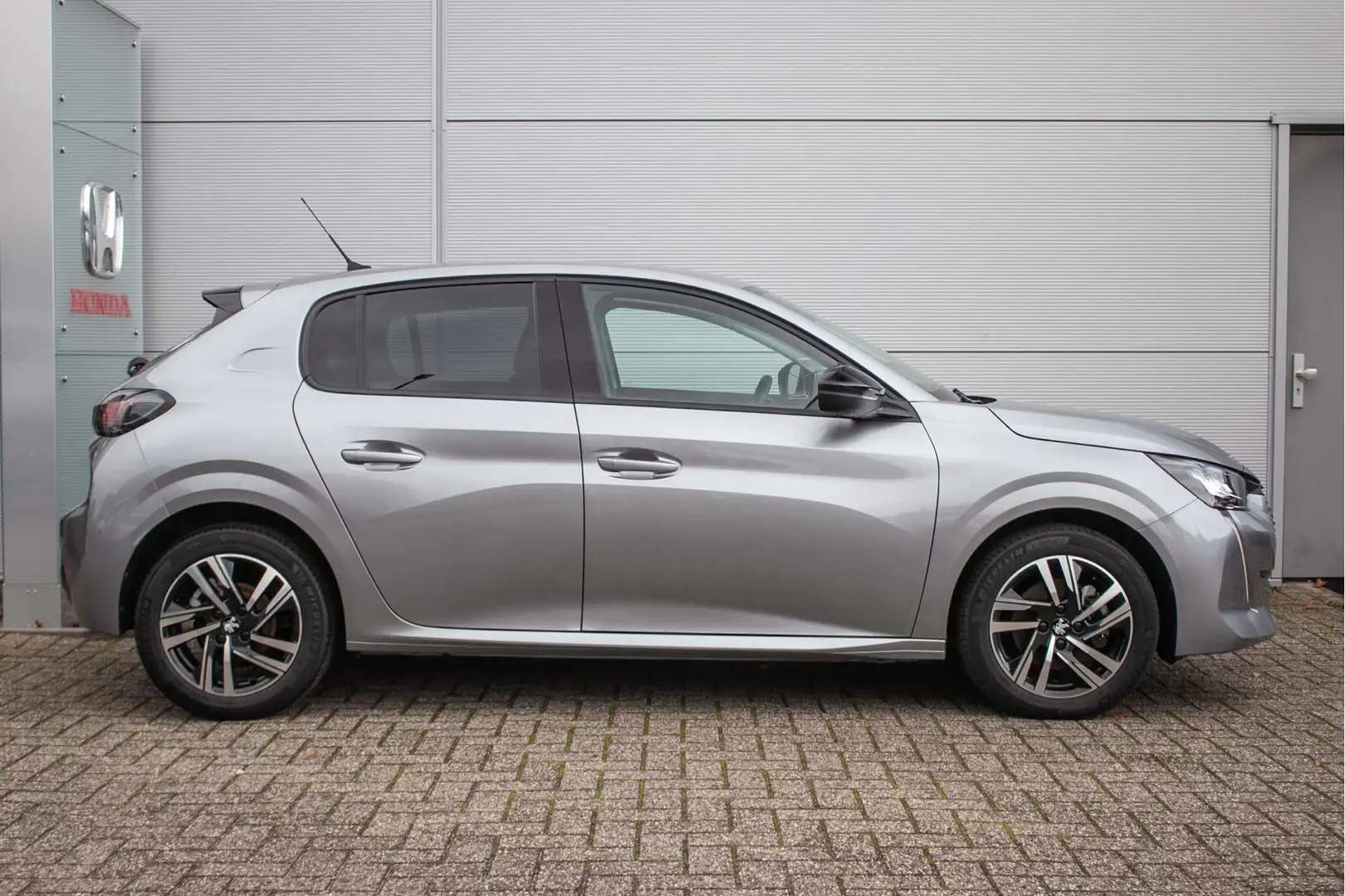 Peugeot 208 1.2 PureTech 100 Allure - Adapt.cruise | Carplay/A Grijs - 2