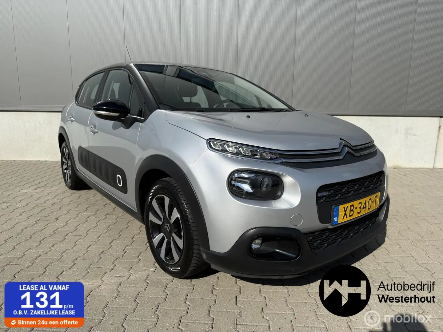 Citroen C3 1.2 PureTech Shine 82PK DEALER ONDERHOUDEN NAVI Grijs - 1