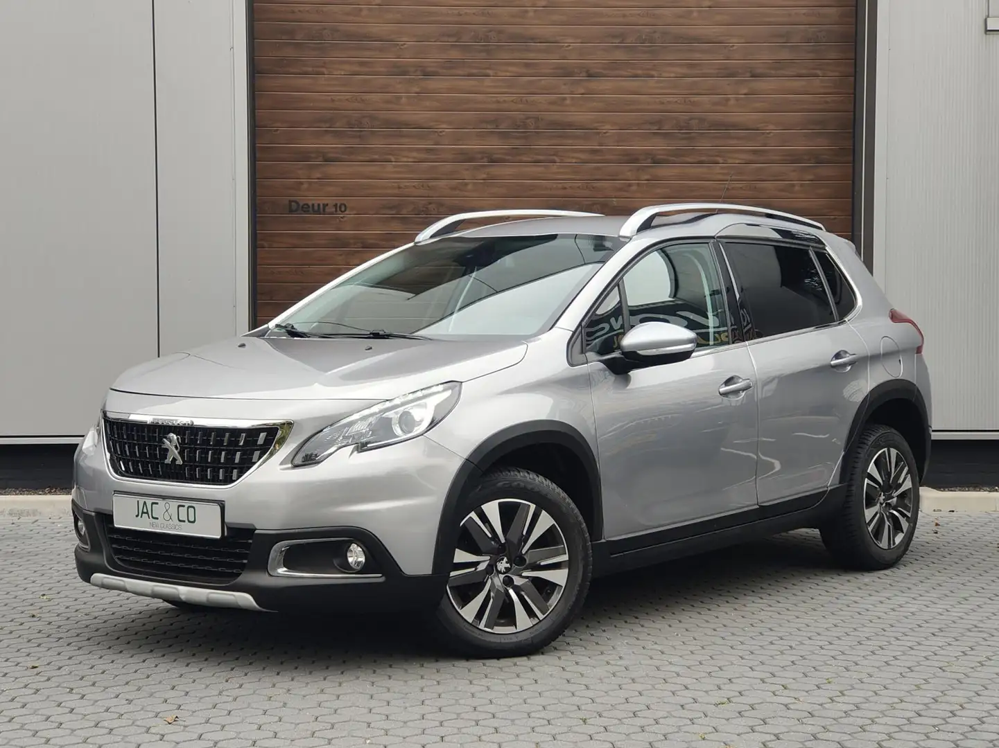 Peugeot 2008 1.2 PureTech Allure NAVI - AUTOMAAT Gris - 1