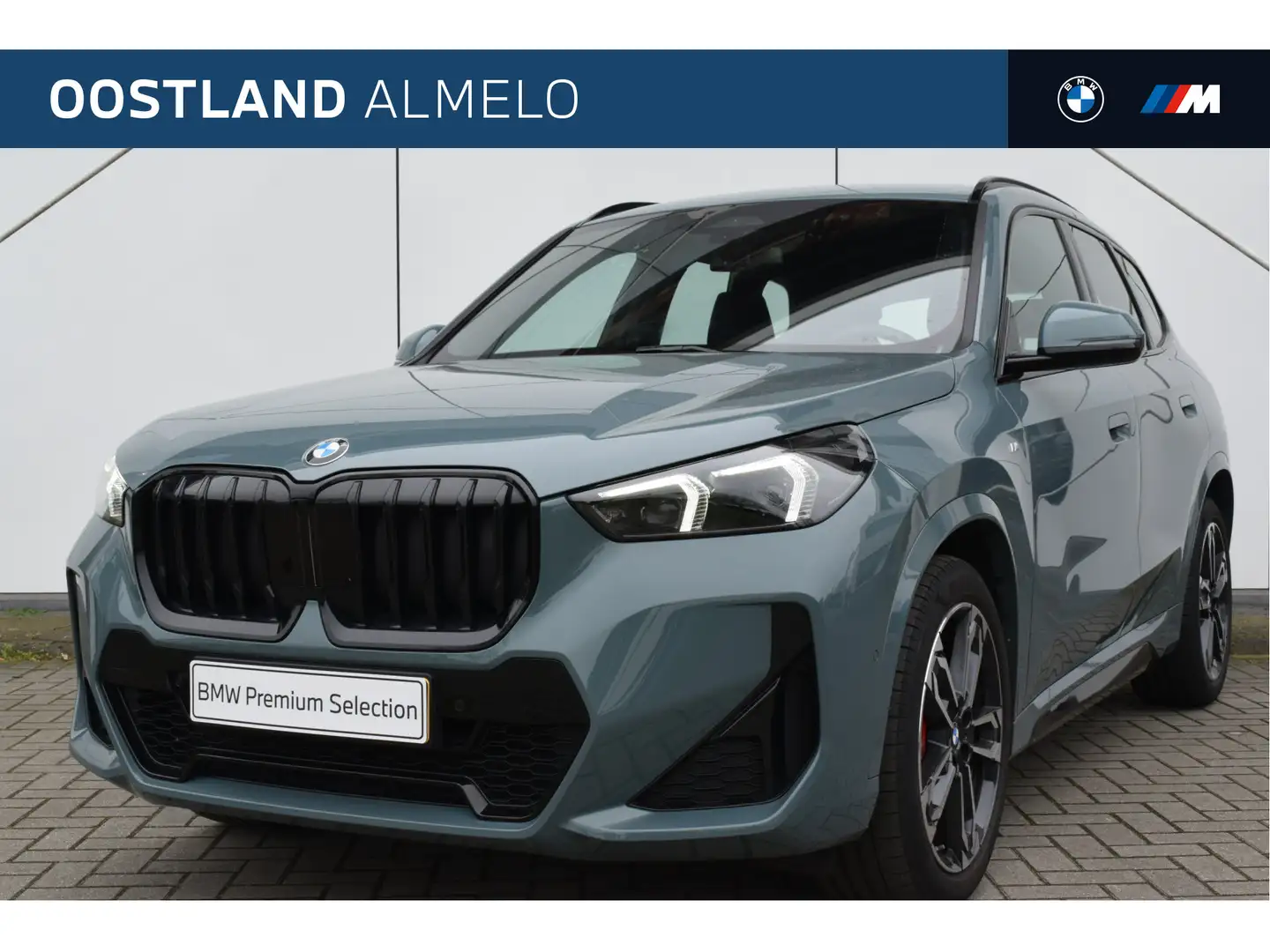 BMW X1 sDrive20i M Sport Automaat / Sportstoelen / Adapti Green - 1