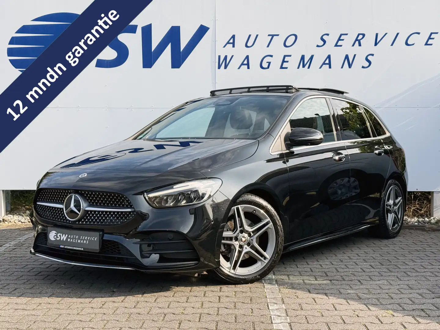 Mercedes-Benz B 200 AMG Line | Pano | Trekhaak | Memory | Camera | LED Zwart - 1