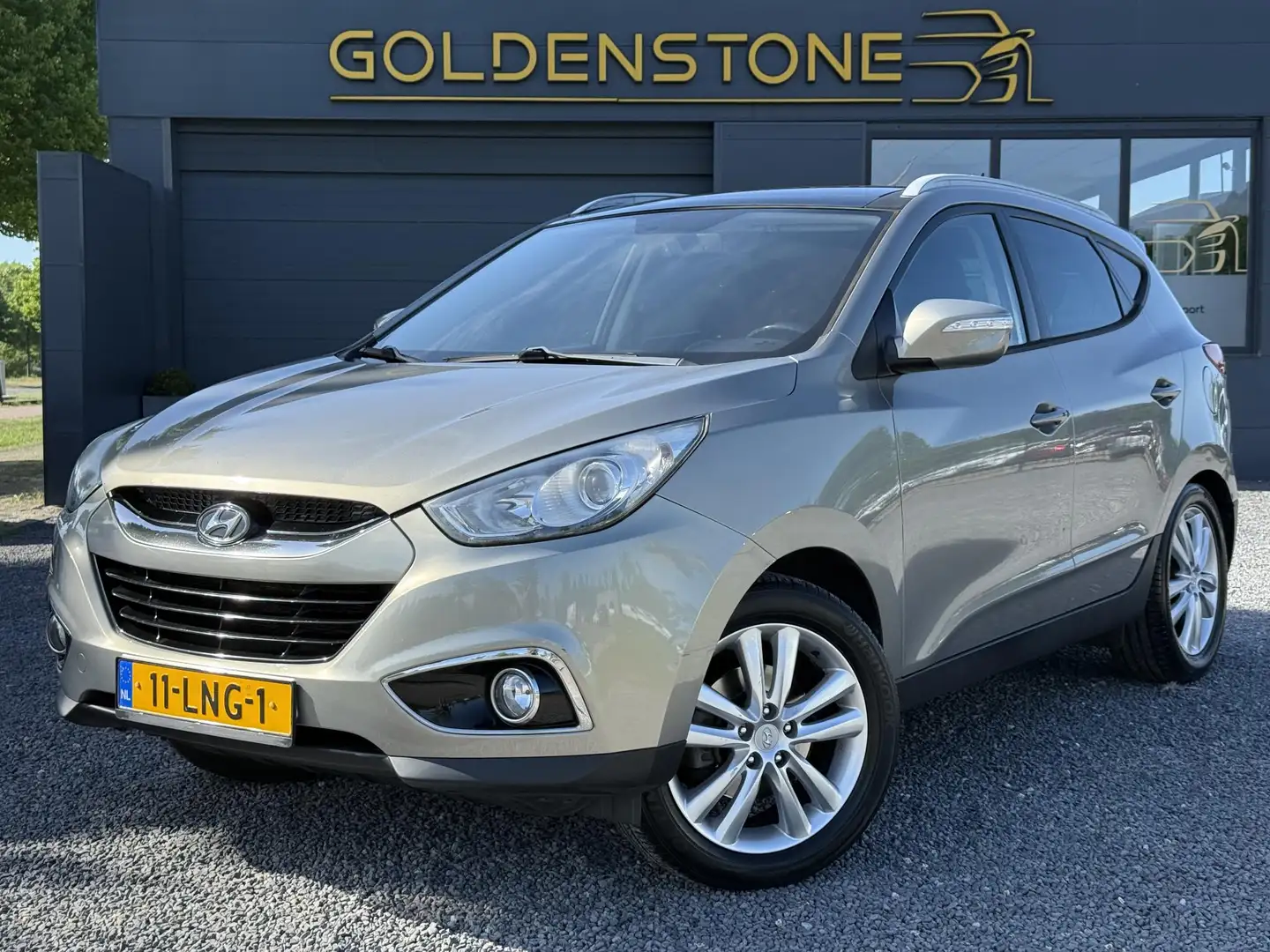 Hyundai iX35 2.0i 4WD i-Catcher 1e Eigenaar,4x4,Pano,Trekhaak,S Grijs - 1