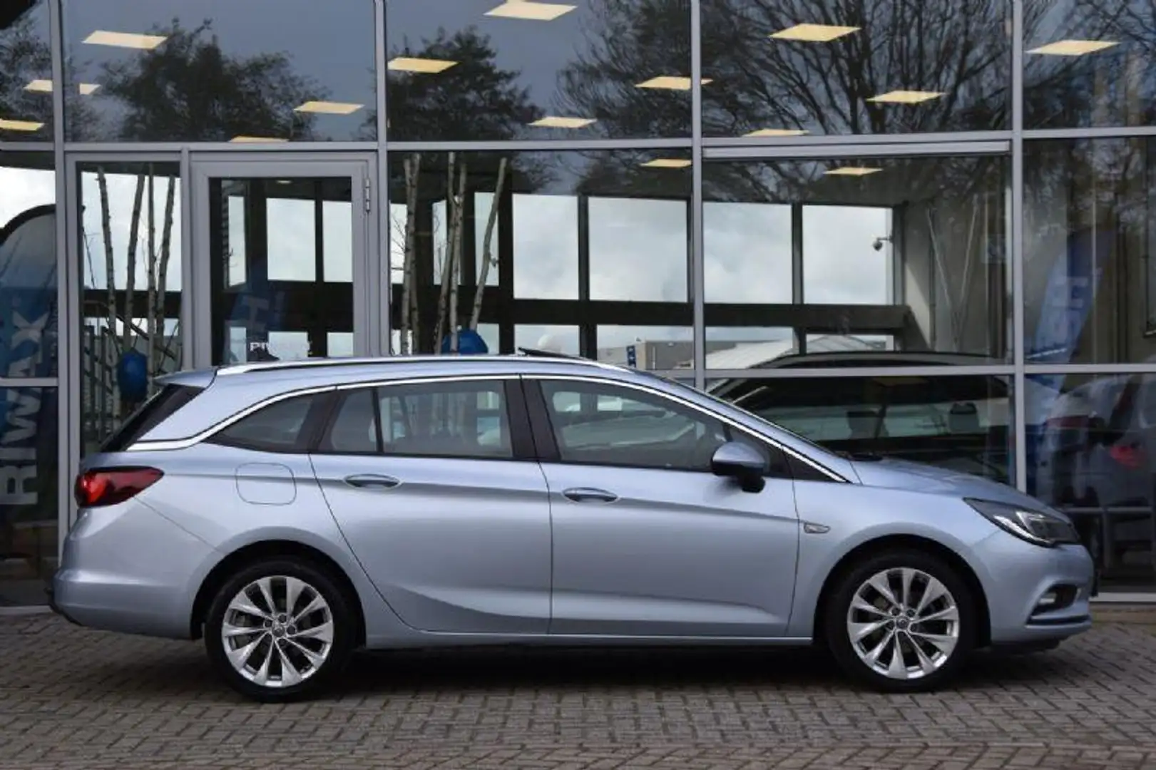 Opel Astra Sports Tourer 1.0 Edition Airco Nav. Dak Led Pdc T Grijs - 2