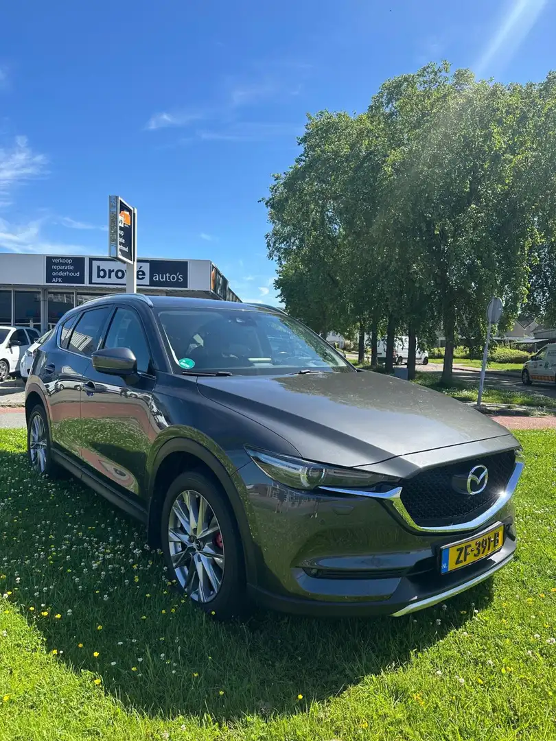 Mazda CX-5 2.0 SkyActiv-G 165 Business Luxury Grijs - 1